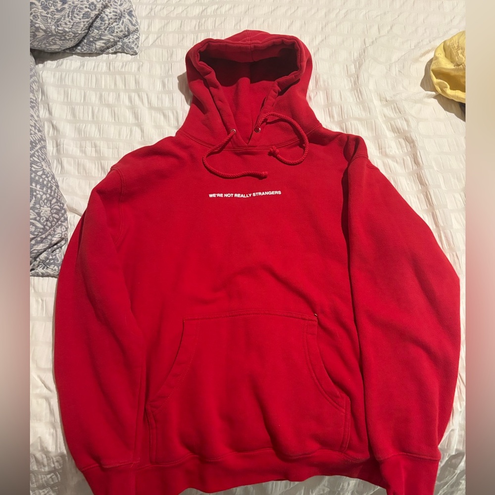 We’re not really strangers logo hoodie